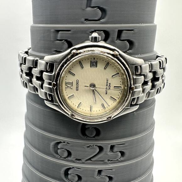 Vintage Seiko 7N82-0599 Ladies Silver Tone Date Watch  display picture 1